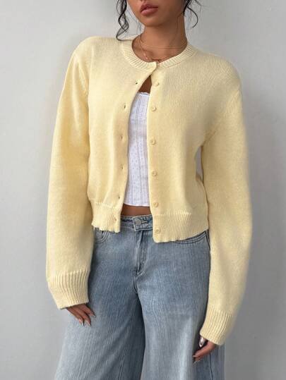 Pale yellow cropped button cardigan at SHEIN