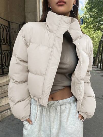 Short cream padded jacket with a stand-up collar at SHEIN
